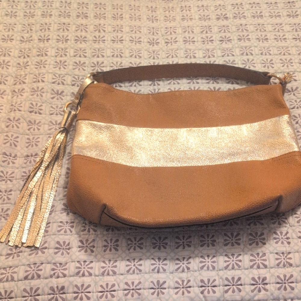 Chic Brown and Gold Clutch with Tassel Accent never used in Excellent Condition